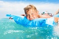 Cute cheeky boy swimming on mattress in sea Royalty Free Stock Photo