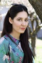 Close portrait of beautiful girl in the nature in springtime Royalty Free Stock Photo