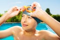 Close portrait of little boy in swimming glasses Royalty Free Stock Photo