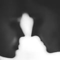 Close portrait of a young couple. Man and woman. Boy and girl in love. Blurred image