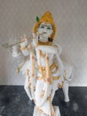 Close potrait photo of beautiful white statue of lord Krishna in the temple of konkan. Royalty Free Stock Photo