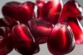 Close of ripe, juicy, red pomegranate seeds