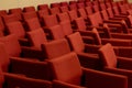 close rows of red armchairs Royalty Free Stock Photo