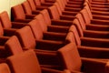 close rows of red armchairs Royalty Free Stock Photo