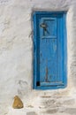 Close shot of blue door on a white house in Mykonos Royalty Free Stock Photo