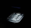 Close shot of cell phone in dark Royalty Free Stock Photo