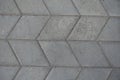 Close shot of gray diamond-shaped concrete pavement with geometric pattern Royalty Free Stock Photo