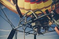 Close shot of a hot air balloon engine with a clear sky in the background