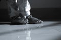 Close shot of Indian baby girl bare feet isolated on floor Royalty Free Stock Photo