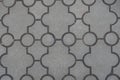 Close shot of pavement of curved grey interlocking concrete tiles Royalty Free Stock Photo