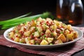 close shot of potato salad with bbq sauce marination Royalty Free Stock Photo