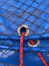 close shot of rope on blue fabric texture background Royalty Free Stock Photo