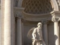 Close up shot of the statue of neptune at trevi fountain, rome,