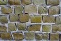 Close shot of olive green mosaic wall