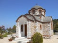 Close side view church of Agios Nikolaos and Agia Anastasia at the fishing harbour of Olympiada, Halkidiki