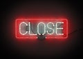 Close Sign made from neon alphabet on a black background