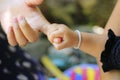 Close to the child is holding an adult hand Royalty Free Stock Photo