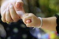 Close to the child is holding an adult hand Royalty Free Stock Photo
