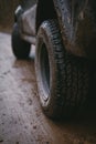 Close to the off-road tire. Protector for various surfaces, universal. Mud, stones, country road. All-wheel drive vehicle. 4x4 SUV Royalty Free Stock Photo