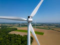 Close to the turbine. Wind turbine from aerial view - Sustainable development, environment friendly. Wind mills during