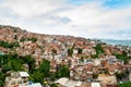 Close up above view of shanty town and slums with daylight in south american city with people