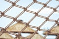 Fishnet fence of a beautiful peaceful beach resort detail