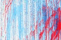 Close-up of abstract dirty corrugated painted metal surface, graffiti. Red and blue peeling paint texture. For modern Royalty Free Stock Photo