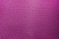 Close-up abstract flat purple high detail textured clothing fabric pattern background partial focus and realistic light