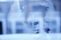 Close up of an abstract frosty blurred patterns on the window, glass. Blue ice winter background, natural texture with Royalty Free Stock Photo