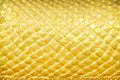 Abstract gold yellow serpent scale statue texture with seamless patterns for background Royalty Free Stock Photo