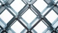 Close-up abstract pattern of structural steel framework in silver tones. Metal grid design with bolts, rivets, connections forms Royalty Free Stock Photo