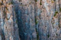 abstract view of rock and cliff as background or texture element. Concept of natural attractions and gorges and canyons Royalty Free Stock Photo