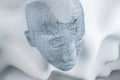 Close up of abstract white human head on wavy background. Future, robotics and artificial intelligence background.