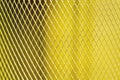 Abstract yellow gold mesh metal texture with seamless  patterns on background Royalty Free Stock Photo