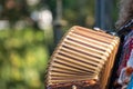 Close up of accordion and accordion player playing at Klezmer concert of Jewish music in Regent`s Park in London Royalty Free Stock Photo