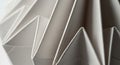 Close-up of an accordion-style paper fold structure, displaying sharp, geometric peaks Royalty Free Stock Photo