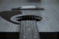 Close up. Acoustic guitar. Black and white , shallow focus Royalty Free Stock Photo