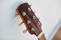 close up of acoustic guitar head with pegs Royalty Free Stock Photo