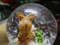 Close up of adorable Christmas reindeer snow globe ornament Royalty Free Stock Photo