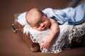 Cute baby sleeping in suitcase. Royalty Free Stock Photo