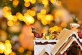 Close up adorable reindeer and santa sleigh with presents for christmas decoration. Displayed on bokeh lights background Royalty Free Stock Photo