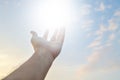 Adult hand reaching out towards the sky Royalty Free Stock Photo