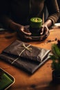 Close-up adult person hands wrapping a Christmas gift