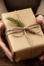 Close-up adult person hands wrapping a Christmas gift