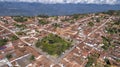 Close-up aerial view of historic town Barichara, Colombia situated on a cliff edge, in the center green plaza and cathedral Royalty Free Stock Photo