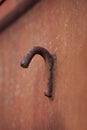 Close up af weathered rusty metal hook