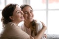 Close up happy mature mother and grownup daughter hugging Royalty Free Stock Photo