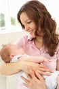 Close Up Of Affectionate Mother Cuddling Baby Boy Royalty Free Stock Photo