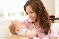 Close Up Of Affectionate Mother Cuddling Baby Boy Royalty Free Stock Photo