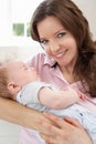 Close Up Of Affectionate Mother Cuddling Baby Boy Royalty Free Stock Photo